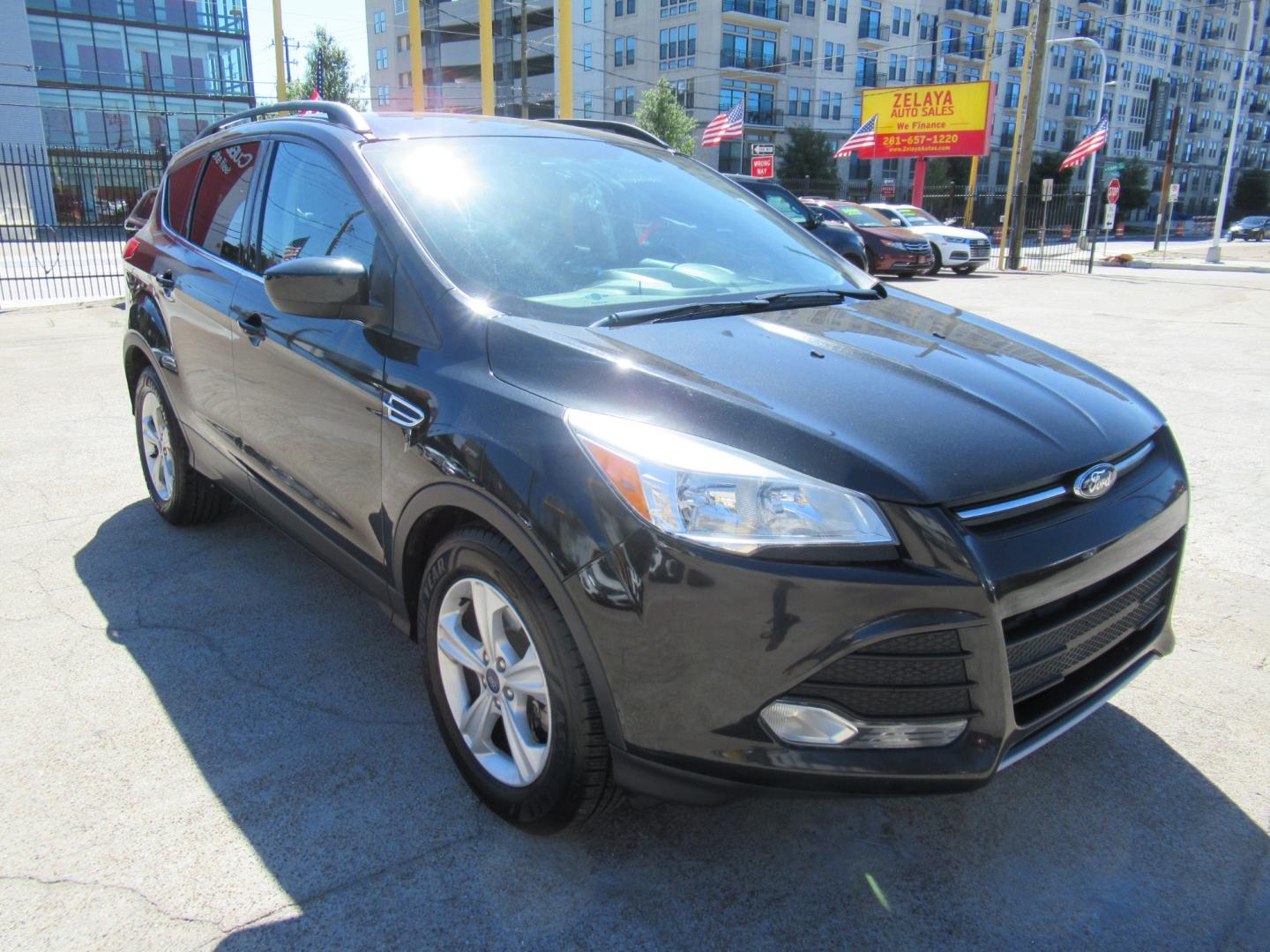 2014 Black /Black Ford Escape SE 4WD (1FMCU9GX5EU) with an 1.6L L4 DOHC 16V engine, Automatic transmission, located at 1511 North Shepherd Dr., Houston, TX, 77008, (281) 657-1221, 29.798361, -95.412560 - 2014 FORD ESCAPE SE VIN: 1FMCU9GX5EUC37295 1 F M C U 9 G X 5 E U C 3 7 2 9 5 4 DOOR WAGON/SPORT UTILITY 1.6L I4 F DOHC 16V GASOLINE FRONT WHEEL DRIVE W/ 4X4 - Photo#21